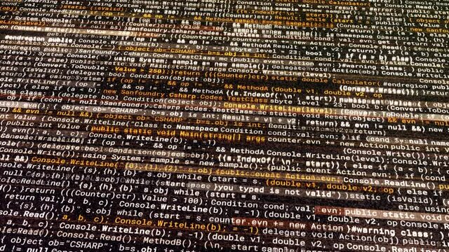 Computer digital screen with an abstract program code, seamless loop. Animation. Horizontal written and moved narrow lines of code in the virtual space.