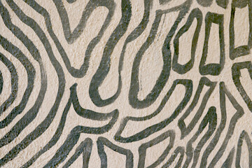 The texture of a stone wall of a building or a ceramic floor.