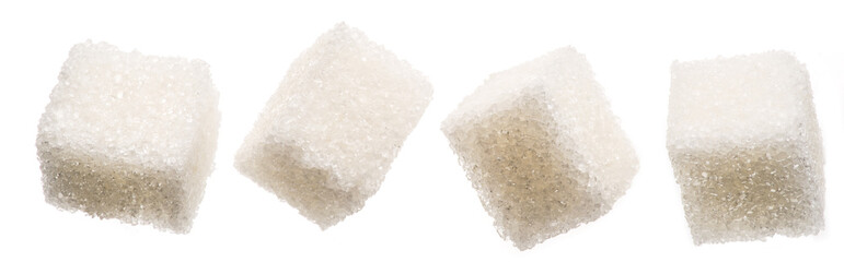 White sugar cubes on white background. Macro picture.