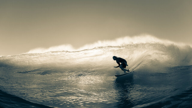 Surfing Surfer Riding Wave Back-light Sepia Water Action Close-Up Panoramic Photo.