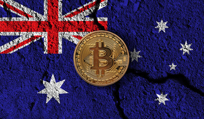 Bitcoin crypto currency coin with cracked Australia flag. Crypto restrictions