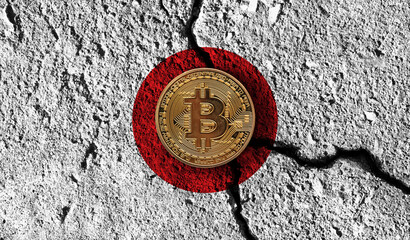 Bitcoin crypto currency coin with cracked Japan flag. Crypto restrictions