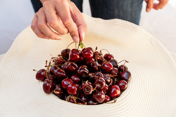 cherries in a hand