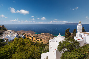 The church of Kioura in the white village of Kardiani overlooking the south coast of the Greek island of Tinos in the Cyclades archipelago