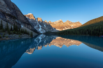Beautiful sunrise at Rocky Mountains in Moraine lake, Banff National Park, Canada.