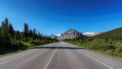 Scenic road trip. Spectacular view of Highway in Rocky Mountains in Icefields Parkway, Banff National Park, Canada.