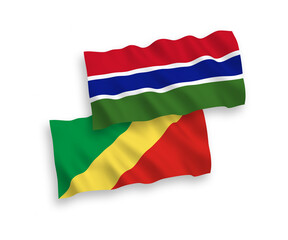 National vector fabric wave flags of Republic of the Congo and Republic of Gambia isolated on white background. 1 to 2 proportion.
