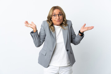 Middle aged business woman over isolated white background having doubts while raising hands