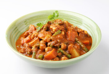 MIX VEGETABLE CURRY- indian recipe, mixed veg containing Carrots, cauliflower, green peas and beans with traditional masala and curry, red hot and spicy 