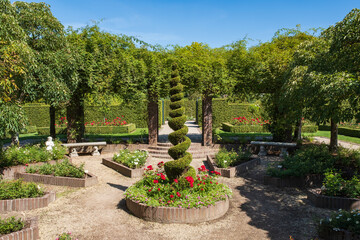 View of part of the castle park in Arcen / Niederlnade with blooming roses 
