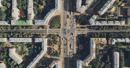 Hyperlapse aerial view of cars moving around the intersection