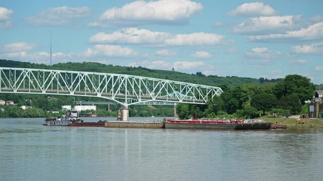 A long shot view of a barge on the Ohio River in Western Pennsylvania.  	
