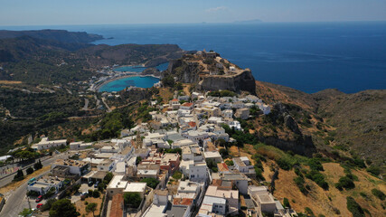 Fototapeta na wymiar Aerial drone photo of picturesque main village in island of Kythira built uphill next to iconic castle overlooking Kapsali bay