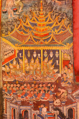 Obraz premium Wall Ancient painting of buddhist temple mural at Wat Phra sing, a famous temple in chiangmai province, Thailand. The temple is open to the public and has beautiful murals on the walls.
