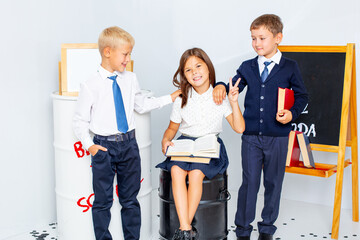 Children schoolboys boys and girls happy beautiful on a white background, back to school