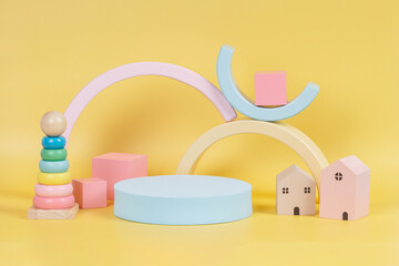 Baby kid toy background. Composition of colorful educational natural wooden toys and geometric...