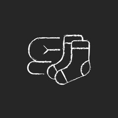 Socks and blanket chalk white icon on dark background. Portable amenities for camping comfort. Essential things for tourist. Travel size objects. Isolated vector chalkboard illustration on black