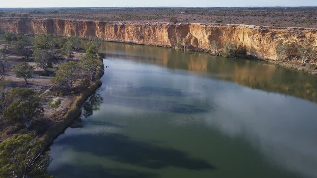 aerial clip flying forward and downstream at big bend on the murray river in south australia