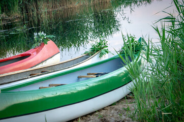 canoe on the lake waiting for meditation boat trip in midsummer evening