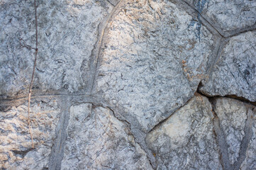 Closeup stone wall. Rough texture