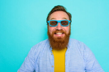 Fototapeta premium Man with beard and sunglasses is very happy