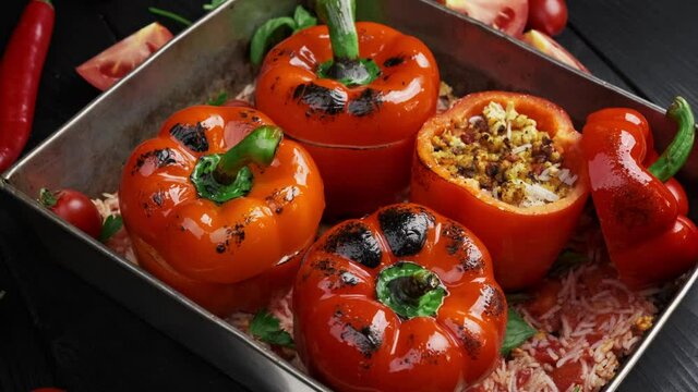 European traditional cuisine. Stuffed peppers with bulgur and vegetables. Flat lay