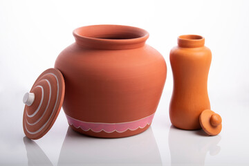 Front View of Earthen Water Cooler and Water  Bottle Isolated on White Background