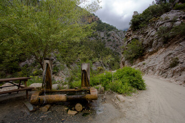 Fototapeta premium Travel through the Goyniuk Canyon. Beautiful places in Turkey. Mountain river and rocks in Kemer.