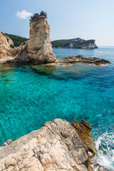 Turquoise water in Mesovrika bay on the north eastern coast of the Greek island of Antipaxos in the...