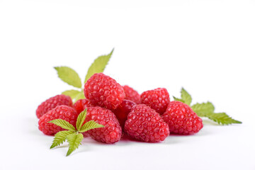 Fototapeta na wymiar Ripe raspberries with raspberry leaf isolated on a white background