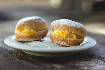 Italian dessert, krapfen with lemon custard