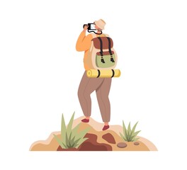 Fototapeta premium Traveller with backpack standing on top of mountain and looking through camera.