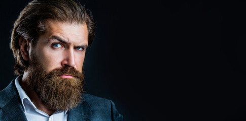 Portrait of handsome bearded man in suit. Male beard and mustache. Sexy male, brutal macho, hipster. Elegant handsome man in suit. Handsome bearded businessman - obrazy, fototapety, plakaty