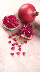 Fresh Pomegranate, rich in natural antioxidants. Concept of red fruits, vitamins and natural antioxidants to the skin for beauty.