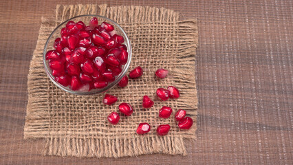 Fresh Pomegranate, rich in natural antioxidants. Concept of red fruits, vitamins and natural antioxidants to the skin for beauty.