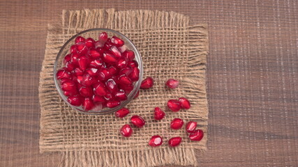 Fresh Pomegranate, rich in natural antioxidants. Concept of red fruits, vitamins and natural antioxidants to the skin for beauty.