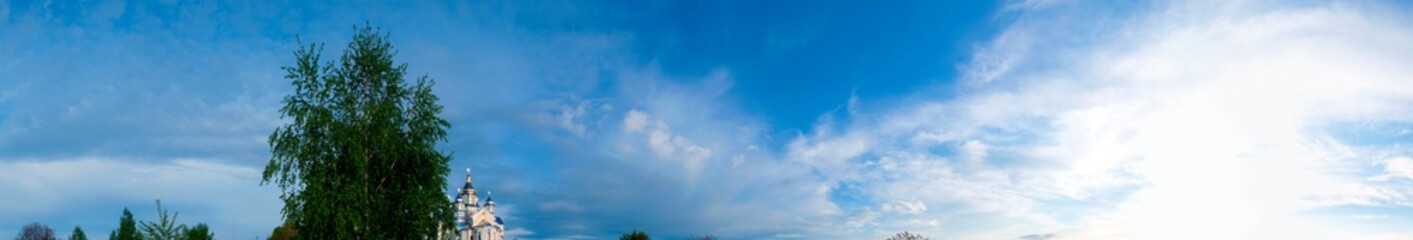panorama of the church dome and the sky with exquisite clouds