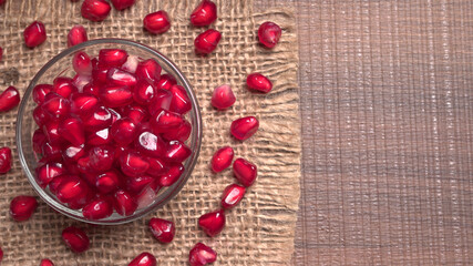 Fresh Pomegranate, rich in natural antioxidants. Concept of red fruits, vitamins and natural antioxidants to the skin for beauty.