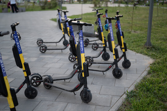 Dolgoprudny, Russia - 21 June 2021: Rental scooter of Urent at parking in the park