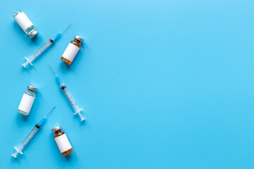 Inject the vaccine. Coronavirus vaccine ampoules with syringe