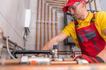 Residential Heating Systems Technician at Work