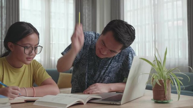 Angry Father Teach His Daughter To Do Homework At Home
