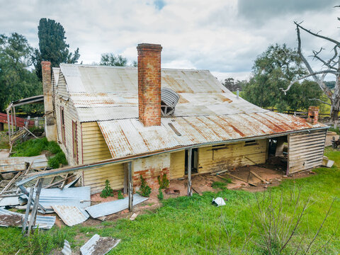 Looking down over an abandoned farmhouse