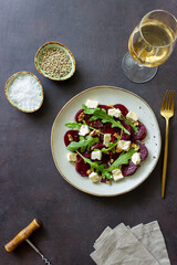 Beetroot salad with cheese, arugula, nuts and honey. Healthy eating. Vegetarian food.