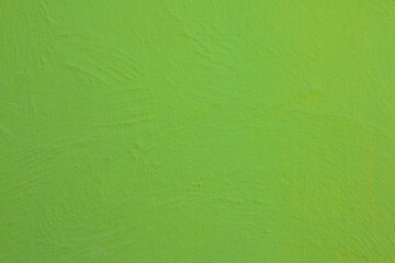 Background with wall texture with green paint.