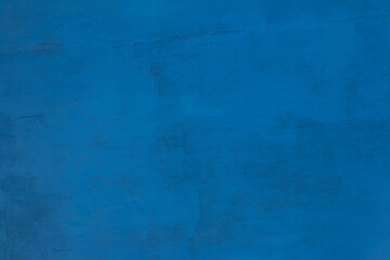 Background with wall texture with old blue paint.
