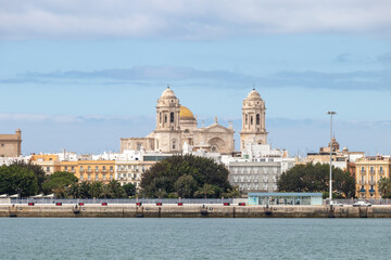 Fototapeta na wymiar View of Cadiz coast with Cadiz Cathedral of the Holy Cross in the background