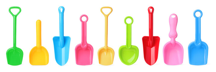 Different bright plastic toy shovels on white background, collage. Banner design