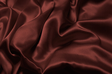 Fototapeta premium Rich and luxury red silk fabric texture background.