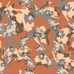 Desert camouflage of various shades of brown, beige, blue and grey colors